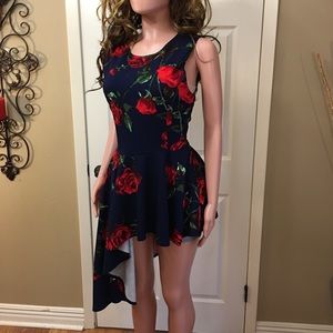 AMAZING floral asymmetrical peplum sleeveless top